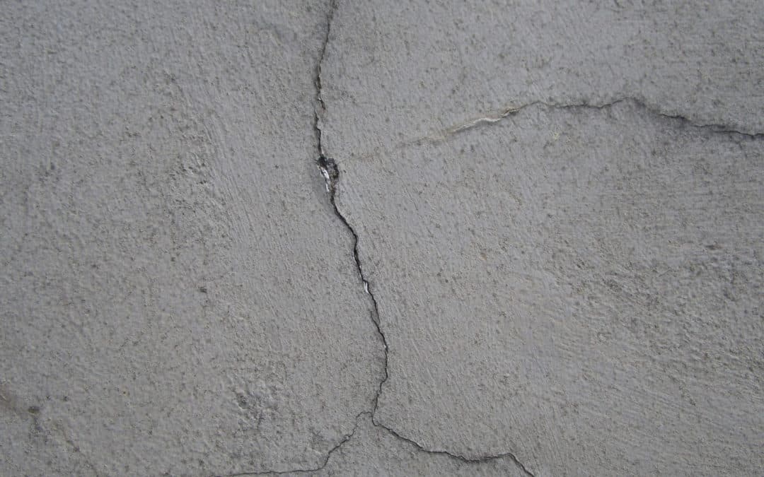 Do painters also repair cracks in stucco?